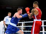 22 June 2015; Dean Gardiner, Ireland, left, exchanges punches with Tony Yoka, France, during their Men's Boxing Super Heavy +91kg Quarter Final bout. 2015 European Games, Crystal Hall, Baku, Azerbaijan. Picture credit: Stephen McCarthy / SPORTSFILE