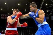 22 June 2015; Joe Joyce, Great Britain, right, exchanges punches with Mantas Valavicius, Lithuania, during their Men's Boxing Super Heavy +91kg Quater Final bout. 2015 European Games, Crystal Hall, Baku, Azerbaijan. Picture credit: Stephen McCarthy / SPORTSFILE