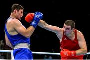 22 June 2015; Gasan Gimbatov, Russia, left, exchanges punches with Yan Sudzilouski, Belarus, during their Men's Boxing Super Heavy +91kg Quater Final bout. 2015 European Games, Crystal Hall, Baku, Azerbaijan. Picture credit: Stephen McCarthy / SPORTSFILE