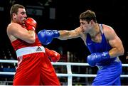 22 June 2015; Gasan Gimbatov, Russia, right, exchanges punches with Yan Sudzilouski, Belarus, during their Men's Boxing Super Heavy +91kg Quater Final bout. 2015 European Games, Crystal Hall, Baku, Azerbaijan. Picture credit: Stephen McCarthy / SPORTSFILE