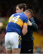 21 June 2015; Seamus Callanan, Tipperary, is attended to by medical personnel before leaving the pitch for a blood injury. Munster GAA Hurling Senior Championship, Semi-Final, Limerick v Tipperary, Gaelic Grounds, Limerick. Picture credit: Brendan Moran / SPORTSFILE