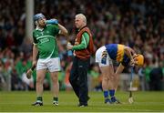21 June 2015; Member of the Limerick backroom team Conor McCarthy gives water to Richie McCarthy during the game. Munster GAA Hurling Senior Championship, Semi-Final, Limerick v Tipperary, Gaelic Grounds, Limerick. Picture credit: Brendan Moran / SPORTSFILE