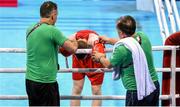 23 June 2015; Dean Walsh, Ireland, accompanied by coaches Billy Walsh, left, and Zaur Antia after being defeated by Sopa Kastriot, Germany, following their Men's Boxing Light Welter 64kg Quarter Final bout. 2015 European Games, Crystal Hall, Baku, Azerbaijan. Picture credit: Stephen McCarthy / SPORTSFILE