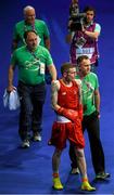 23 June 2015; Dean Walsh, Ireland, accompanied by coaches Billy Walsh, right, Zaur Antia and Gerry Storey make their way to the ring before his Men's Boxing Light Welter 64kg Quarter Final bout with Sopa Kastriot, Germany. 2015 European Games, Crystal Hall, Baku, Azerbaijan. Picture credit: Stephen McCarthy / SPORTSFILE