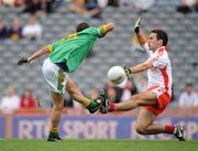 31 August 2008; Paddy Gilsenan, Meath, has his shot blocked by Martin Rogers, Tyrone. Referee Michael Meade subsequently awarded a penalty to Meath for this tackle. ESB GAA Football All-Ireland Minor Championship Semi-Final, Meath v Tyrone, Croke Park, Dublin. Picture credit: Brendan Moran / SPORTSFILE