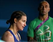 24 June 2015; Katie Taylor, Ireland, accompanied by her father and coach Pete, is interviewed following her Women's Boxing Light 60kg Quarter Final bout with Ida Lundblad, Sweden. 2015 European Games, Crystal Hall, Baku, Azerbaijan. Picture credit: Stephen McCarthy / SPORTSFILE