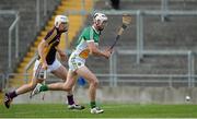24 June 2015; Emmet Nolan, Offaly, in action against Liam Ryan, Wexford. Bord Gáis Energy Leinster GAA Hurling U21 Championship, Semi-Final, Offaly v Wexford. O'Connor Park, Tullamore, Co. Offaly. Picture credit: Piaras Ó Mídheach / SPORTSFILE