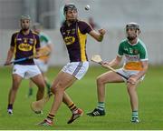 24 June 2015; Jack O'Connor, Wexford, in action against Joe Maher, Offaly. Bord Gáis Energy Leinster GAA Hurling U21 Championship, Semi-Final, Offaly v Wexford. O'Connor Park, Tullamore, Co. Offaly. Picture credit: Piaras Ó Mídheach / SPORTSFILE