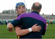 24 June 2015; Wexford's Kevin Foley celebrates with selector Larry Murphy after the game. Bord Gáis Energy Leinster GAA Hurling U21 Championship, Semi-Final, Offaly v Wexford. O'Connor Park, Tullamore, Co. Offaly. Picture credit: Piaras Ó Mídheach / SPORTSFILE