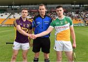 24 June 2015; Referee Peter Burke with Wexford captain Eoin Conroy and Offaly captain Conor Doughan. Bord Gáis Energy Leinster GAA Hurling U21 Championship, Semi-Final, Offaly v Wexford, O'Connor Park, Tullamore, Co. Offaly. Picture credit: Matt Browne / SPORTSFILE