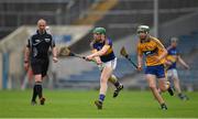 25 June 2015; Brian McGrath, Tipperary, in action against Alan Tynan, Clare. 2015 Electric Ireland Munster GAA Hurling Minor Championship, Clare v Tipperary. Semple Stadium, Thurles, Co. Tipperary. Picture credit: Ray McManus / SPORTSFILE