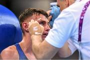26 June 2015; Sean McComb, Ireland, has a cut attended to by coach Billy Walsh during his Men's Boxing Light 60kg Semi-Final bout against Albert Selimov, Azerbaijan. 2015 European Games, Crystal Hall, Baku, Azerbaijan. Picture credit: Stephen McCarthy / SPORTSFILE