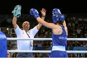 26 June 2015; Katie Taylor, Ireland, celebrates her victory  with coach and father Pete, following her victory over Yana Alekseevna, Azerbaijan, in their Women's Boxing Light 60kg Semi-Final bout. 2015 European Games, Crystal Hall, Baku, Azerbaijan. Picture credit: Stephen McCarthy / SPORTSFILE