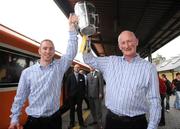 8 September 2008; Kilkenny's James 'Cha' Fitzpatrick and Brian Cody, manager, with the Liam MacCarthy Cup at the train station prior to the victorious Kilkenny team's departure to Kilkenny for their homecoming. Heuston Station, Dublin. Picture credit; Pat Murphy / SPORTSFILE