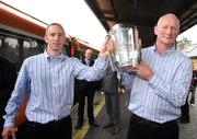 8 September 2008; Kilkenny's James 'Cha' Fitzpatrick and Brian Cody, manager, with the Liam MacCarthy Cup at the train station prior to the victorious Kilkenny team's departure to Kilkenny for their homecoming. Heuston Station, Dublin. Picture credit; Pat Murphy / SPORTSFILE