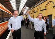 8 September 2008; Kilkenny's Canice Hickey, left, and James 'Cha' Fitzpatrick lift the Liam MacCarthy Cup upon arrival at the train station prior to the victorious Kilkenny team's departure to Kilkenny for their homecoming. Heuston Station, Dublin. Picture credit; Pat Murphy / SPORTSFILE