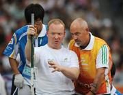 8 September 2008; Eoin Cleare, from Birr, Co. Offaly, consults Assistant Michael Bergin, from Wexford, during the Men's Shot Putt Final - F32. Eoin finished in 7th position overall with a distance of 6.11. Beijing Paralympic Games 2008, Men's Shot Putt Final F32, National Stadium, Olympic Green, Beijing, China. Picture credit: Brian Lawless / SPORTSFILE