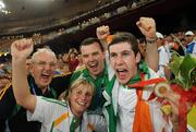 10 September 2008; Ireland's Michael McKillop, from Glengormley, Co. Antrim, celebrates with, from left, Chef de Mission, Jimmy, Byrne, Killester, Dublin, Camp Training Manager Nancy Chillingworth, Mornington, Meath, and Paralympic Performance Director Liam Harbison, Termonfeckin, Louth, after winning the Gold medal in the Men's 800m - T37 in a World Record Time of 1:59.39. Beijing Paralympic Games 2008, Men's 800m - T37, National Stadium, Olympic Green, Beijing, China. Picture credit: Brian Lawless / SPORTSFILE