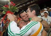 10 September 2008; Ireland's Michael McKillop, from Glengormley, Co. Antrim, celebrates with, from left, Chef de Mission Jimmy Byrne, Killester, Dublin, Camp Training Manager Nancy Chillingworth, Mornington, Meath, and Paralympic Performance Director Liam Harbison, Termonfeckin, Louth, after winning the Gold medal in the Men's 800m - T37 in a World Record Time of 1:59.39. Beijing Paralympic Games 2008, Men's 800m - T37, National Stadium, Olympic Green, Beijing, China. Picture credit: Brian Lawless / SPORTSFILE