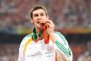 10 September 2008; Ireland's Michael McKillop, from Glengormley, Co. Antrim, celebrates with his Gold medal after winning the Men's 800m - T37 in a World Record Time of 1:59.39. Beijing Paralympic Games 2008, Men's 800m - T37, National Stadium, Olympic Green, Beijing, China. Picture credit: Brian Lawless / SPORTSFILE