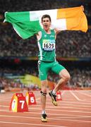 10 September 2008; Ireland's Michael McKillop, from Glengormley, Co. Antrim, dances an Irish Jig in celebration after winning Gold in the Men's 800m - T37 in a World Record Time of 1:59.39. Beijing Paralympic Games 2008, Men's 800m - T37, National Stadium, Olympic Green, Beijing, China. Picture credit: Brian Lawless / SPORTSFILE