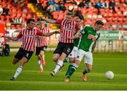 26 June 2015; Garry Buckley, Cork City, in action against Philip Lowry and Ronan Curtis, Derry City. SSE Airtricity League Premier Division, Derry City v Cork City, Brandywell, Derry. Picture credit: Oliver McVeigh / SPORTSFILE