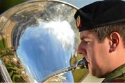 26 June 2015; A member of the Irish Army Band performs during the Final Leg of Jumping In The City. Shelbourne Park Greyhound Stadium, Ringsend, Dublin. Picture credit: Cody Glenn / SPORTSFILE