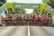 27 June 2015; A general view of runners starting the SSE Airtricity 5 mile race. Phoenix Park, Dublin.  Picture credit: Seb Daly / SPORTSFILE