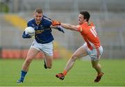 27 June 2015; Dean Healy, Wicklow, in action against Aidan Forker, Armagh. GAA Football All-Ireland Senior Championship, Round 1B, Armagh v Wicklow. Athletic Grounds, Armagh. Picture credit: Piaras Ó Mídheach / SPORTSFILE