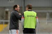 27 June 2015; Armagh captain Ciarán McKeever, who did not start the game due to injury, talks with manager Kieran McGeeney before the game. GAA Football All-Ireland Senior Championship, Round 1B, Armagh v Wicklow. Athletic Grounds, Armagh. Picture credit: Piaras Ó Mídheach / SPORTSFILE