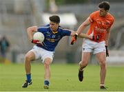 27 June 2015; Ross O'Brien, Wicklow, in action against Ethan Rafferty, Armagh. GAA Football All-Ireland Senior Championship, Round 1B, Armagh v Wicklow. Athletic Grounds, Armagh. Picture credit: Piaras Ó Mídheach / SPORTSFILE
