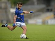 27 June 2015; Paul Cronin, Wicklow, takes a free. GAA Football All-Ireland Senior Championship, Round 1B, Armagh v Wicklow. Athletic Grounds, Armagh. Picture credit: Piaras Ó Mídheach / SPORTSFILE