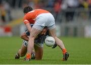 27 June 2015; Anthony McLoughlin, Wicklow, tries to find a way past Aidan Forker, Armagh. GAA Football All-Ireland Senior Championship, Round 1B, Armagh v Wicklow. Athletic Grounds, Armagh. Picture credit: Piaras Ó Mídheach / SPORTSFILE