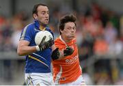 27 June 2015; Anthony McLoughlin, Wicklow, in action against Caolan Rafferty, Armagh. GAA Football All-Ireland Senior Championship, Round 1B, Armagh v Wicklow. Athletic Grounds, Armagh. Picture credit: Piaras Ó Mídheach / SPORTSFILE