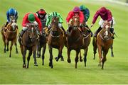 27 June 2015; Colour Blue, with Connor King up, second from left, on their way to winning the Dubai Duty Free Full Of Surprises Celebration Stakes. Curragh Derby Festival. The Curragh, Co. Kildare. Picture credit: Cody Glenn / SPORTSFILE