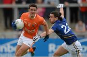 27 June 2015; Stefan Campbell, Armagh, in action against Paul Cunningham, Wicklow. GAA Football All-Ireland Senior Championship, Round 1B, Armagh v Wicklow. Athletic Grounds, Armagh. Picture credit: Piaras Ó Mídheach / SPORTSFILE