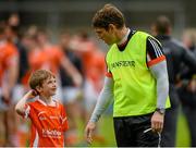 27 June 2015; Armagh manager Kieran McGeeney in conversation with his son Cian, age 7, after the game. GAA Football All-Ireland Senior Championship, Round 1B, Armagh v Wicklow. Athletic Grounds, Armagh. Picture credit: Piaras Ó Mídheach / SPORTSFILE