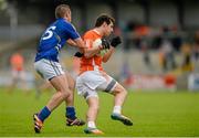27 June 2015; Jamie Clarke, Armagh, in action against John McGrath, Wicklow. GAA Football All-Ireland Senior Championship, Round 1B, Armagh v Wicklow. Athletic Grounds, Armagh. Picture credit: Piaras Ó Mídheach / SPORTSFILE