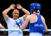 27 June 2015; Katie Taylor, Ireland, is greeted by her father and coach Pete Taylor after defeating Estelle Mossely, France, following their Women's Boxing Light 60kg Final bout. 2015 European Games, Crystal Hall, Baku, Azerbaijan. Picture credit: Stephen McCarthy / SPORTSFILE