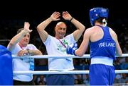 27 June 2015; Katie Taylor, Ireland, is greeted by her father and coach Pete Taylor and coach Zaur Antia, left, after defeating Estelle Mossely, France, following their Women's Boxing Light 60kg Final bout. 2015 European Games, Crystal Hall, Baku, Azerbaijan. Picture credit: Stephen McCarthy / SPORTSFILE