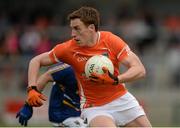 27 June 2015; Charlie Vernon, Armagh, in action against John McGrath, Wicklow. GAA Football All-Ireland Senior Championship, Round 1B, Armagh v Wicklow. Athletic Grounds, Armagh. Picture credit: Piaras Ó Mídheach / SPORTSFILE