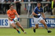 27 June 2015; Stefan Campbell, Armagh, in action against Stephen Kelly, Wicklow. GAA Football All-Ireland Senior Championship, Round 1B, Armagh v Wicklow. Athletic Grounds, Armagh. Picture credit: Piaras Ó Mídheach / SPORTSFILE