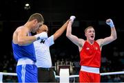 27 June 2015; Michael O'Reilly, Ireland, is announced victorious over Zaybula Musalov, Azerbaijan, by referee Mik Basi, following their Men's Boxing Middle 75kg Final bout. 2015 European Games, Crystal Hall, Baku, Azerbaijan. Picture credit: Stephen McCarthy / SPORTSFILE