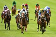 27 June 2015; Hansanour, centre right, with Shane Foley up (yellow and blue cap), on their way to winning the Paddy Power Handicap. The Curragh, Co. Kildare. Picture credit: Cody Glenn / SPORTSFILE