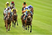 27 June 2015; Hasaanour, right, with Shane Foley up (yellow and blue cap), on their way to winning the Paddy Power Handicap. The Curragh, Co. Kildare. Picture credit: Cody Glenn / SPORTSFILE