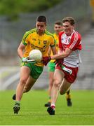 27 June 2015; Brendan McCole, Donegal, in action against Jack Doherty, Derry.  Electric Ireland Ulster GAA Football Minor Championship, Semi Final, Derry v Donegal. St Tiernach's Park, Clones, Co. Monaghan. Picture credit: Ramsey Cardy / SPORTSFILE