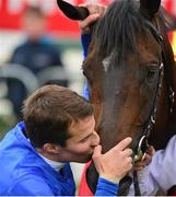 27 June 2015; Jockey William Buick kisses his mount Jack Hobbs after they won the Dubai Duty Free Irish Derby. Curragh Derby Festival. The Curragh, Co. Kildare. Picture credit: Cody Glenn / SPORTSFILE