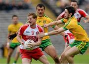 27 June 2015; Enda Lynn, Derry, in action against Frank McGlynn and Ryan McHugh, Donegal. Ulster GAA Football Senior Championship, Semi-Final, Derry v Donegal. St Tiernach's Park, Clones, Co. Monaghan. Picture credit: Oliver McVeigh / SPORTSFILE