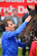 27 June 2015; Jockey William Buick pats Jack Hobbs after winning the Dubai Duty Free Irish Derby. Curragh Derby Festival. The Curragh, Co. Kildare. Picture credit: Cody Glenn / SPORTSFILE