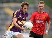 27 June 2015; Brian Malone, Wexford, in action against Paul Devlin, Down. GAA Football All-Ireland Senior Championship, Round 1B, Wexford v Down. Innovate Wexford Park, Wexford. Picture credit: Matt Browne / SPORTSFILE